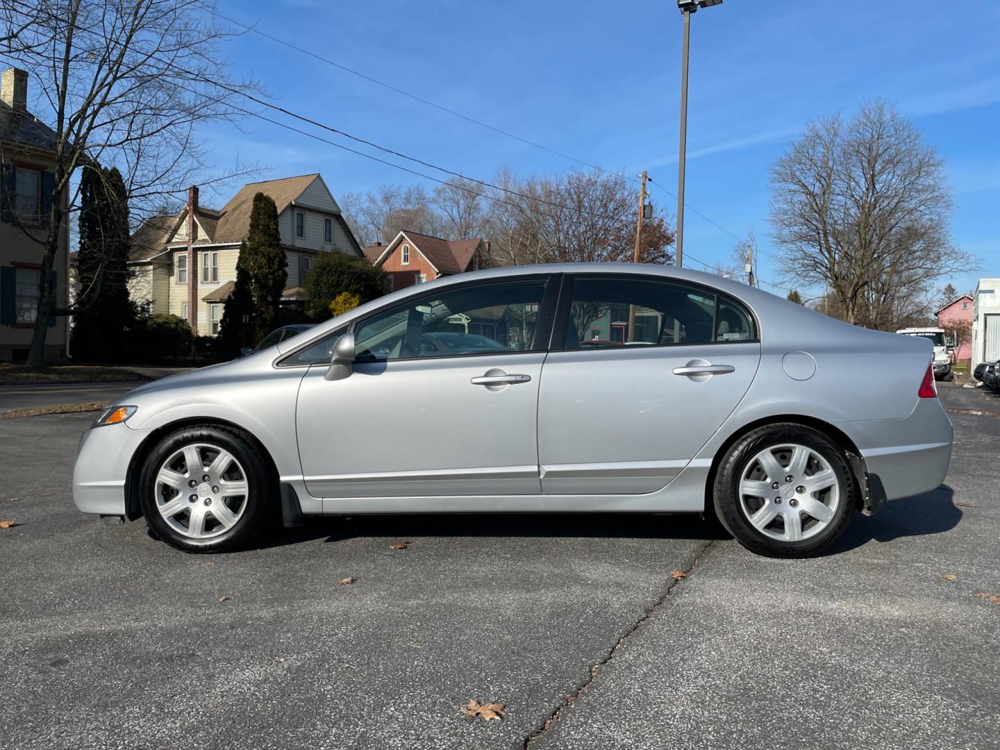 2009 silver Honda Civic LX Sedan 5-Speed AT (2HGFA16529H) with an 1.8L L4 SOHC 16V engine, 5-Speed Automatic transmission, located at 101 N. Main Street, Muncy, PA, 17756, (570) 546-5462, 41.207691, -76.785942 - Photo#3